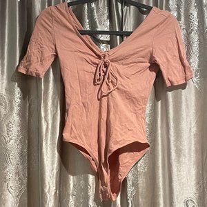 Juniors Light Pink Short Sleeve Bodysuit